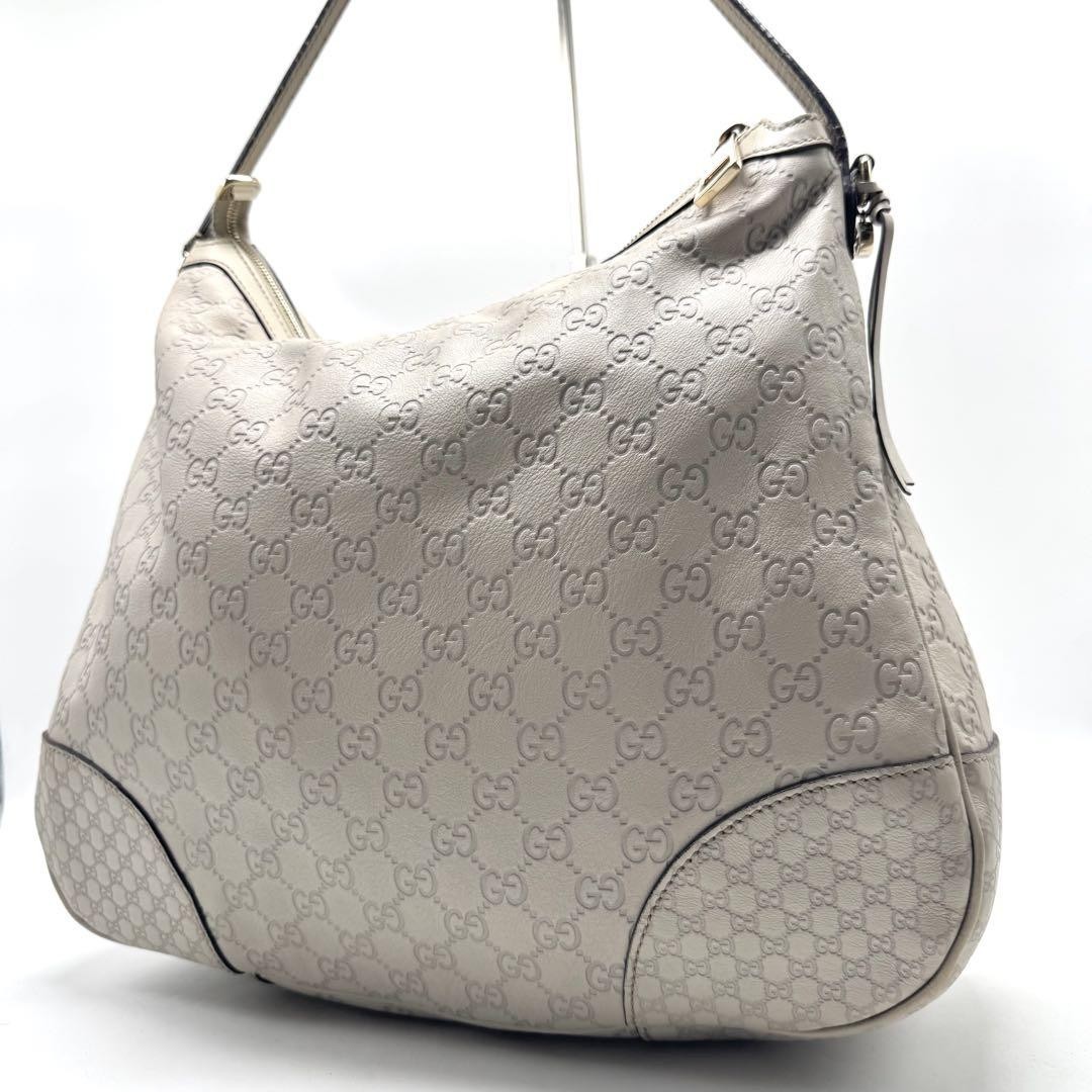 Borsa a tracolla GUCCI GG Guccissima pelle intrecciata logo bianco avorio