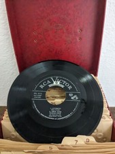 45 RPM Records And Case 75 Vinyls With Dividers And A Red Case