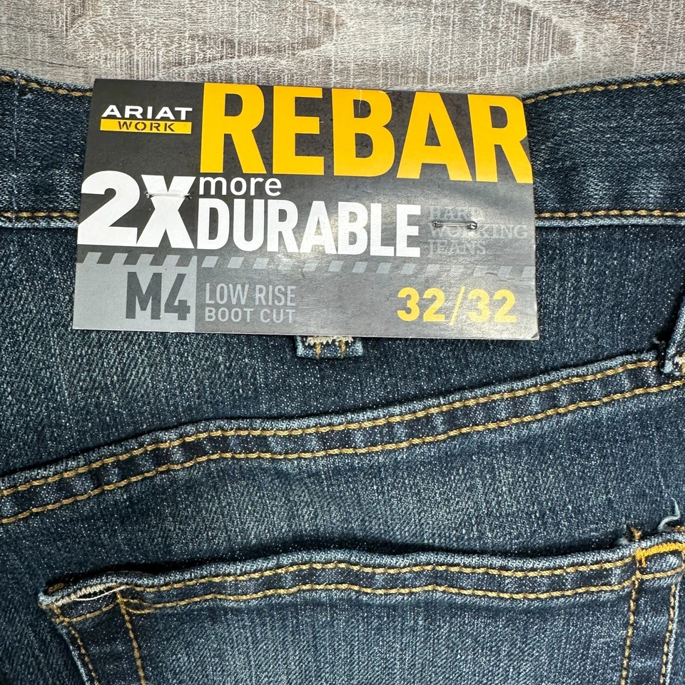NUEVO CON ETIQUETAS Ariat Rebar M4 2X Pantalones de mezclilla duraderos tiro bajo corte bota para hombre 32x32 ropa de trabajo Foto 3 de 4