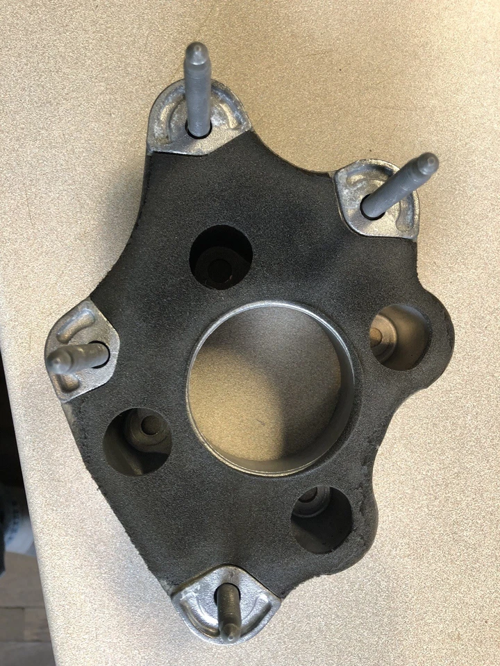 Nissan Cube 2011, brida de refuerzo de freno eléctrico. OEM Foto 4 de 4