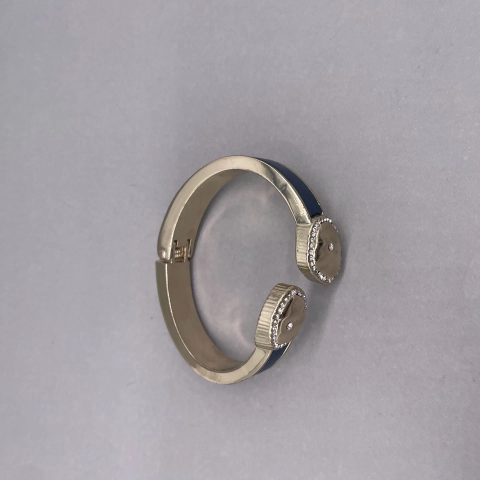 Brazalete con bisagras de diamantes de imitación del mercado negro de la Casa Blanca tono dorado azul Foto 4 de 4