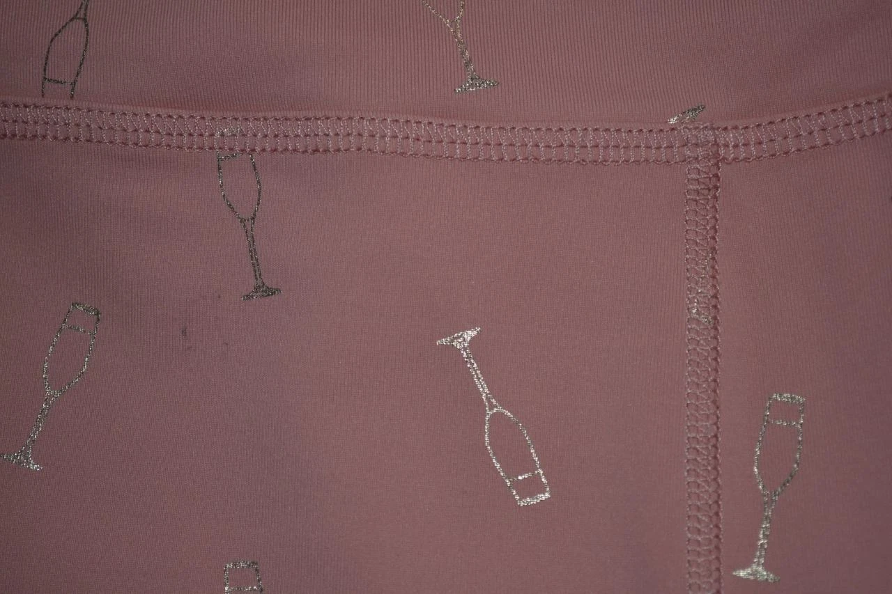 beyond-yoga champagne glass design leggings