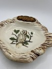 Brown ceramic trinket dish with white owl and green leaves, labeled “Grand Canyon” in gold lettering on lid.