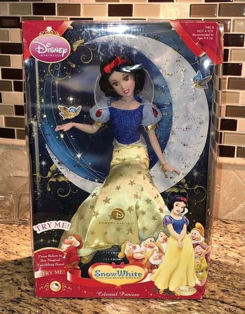 disney brass key porcelain dolls