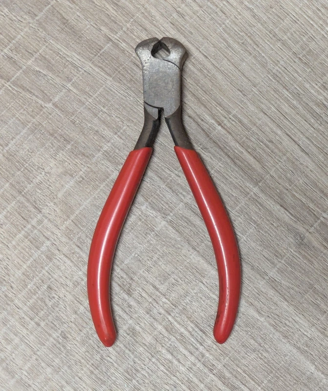 Kraeuter 20182 4-inch end cutting nippers with red grips