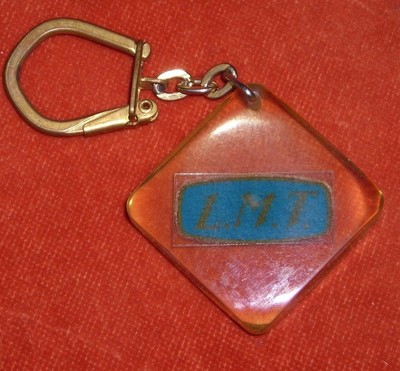 Bourbon key ring? L.M.T. Thomson Subsidiary Telephone Equipment