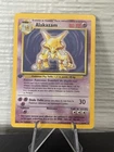 The Pokémon Company Alakazam 1/102 Base Set 1st Edition Holo Rare MP/LP