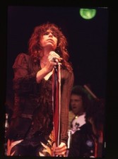 Aerosmith Steven Tyler singing in concert red spotlight Original Transparency