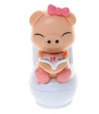 A She Piglet Reading on Toilet Bowl Pig Solar Toy Dashboard Home Decor Gift