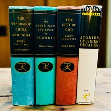 A curated set of vintage Modern Library Giants hardcovers — Thomas Mann, Pushkin, Augustine — beautiful spines that double as intellectual shelf decor.