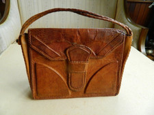 sac à main en cuir serpent dim. 30 x 21 cm.