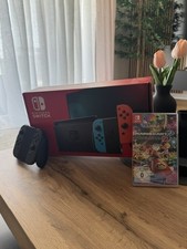 Nintendo Switch Konsole + Mario Kart 8 Deluxe + grauer Controller …