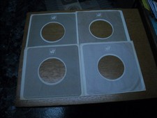 45RPM COMPANY SLEEVES. LOT OF FOUR GRAY-ISH WARNER BROTHERS.