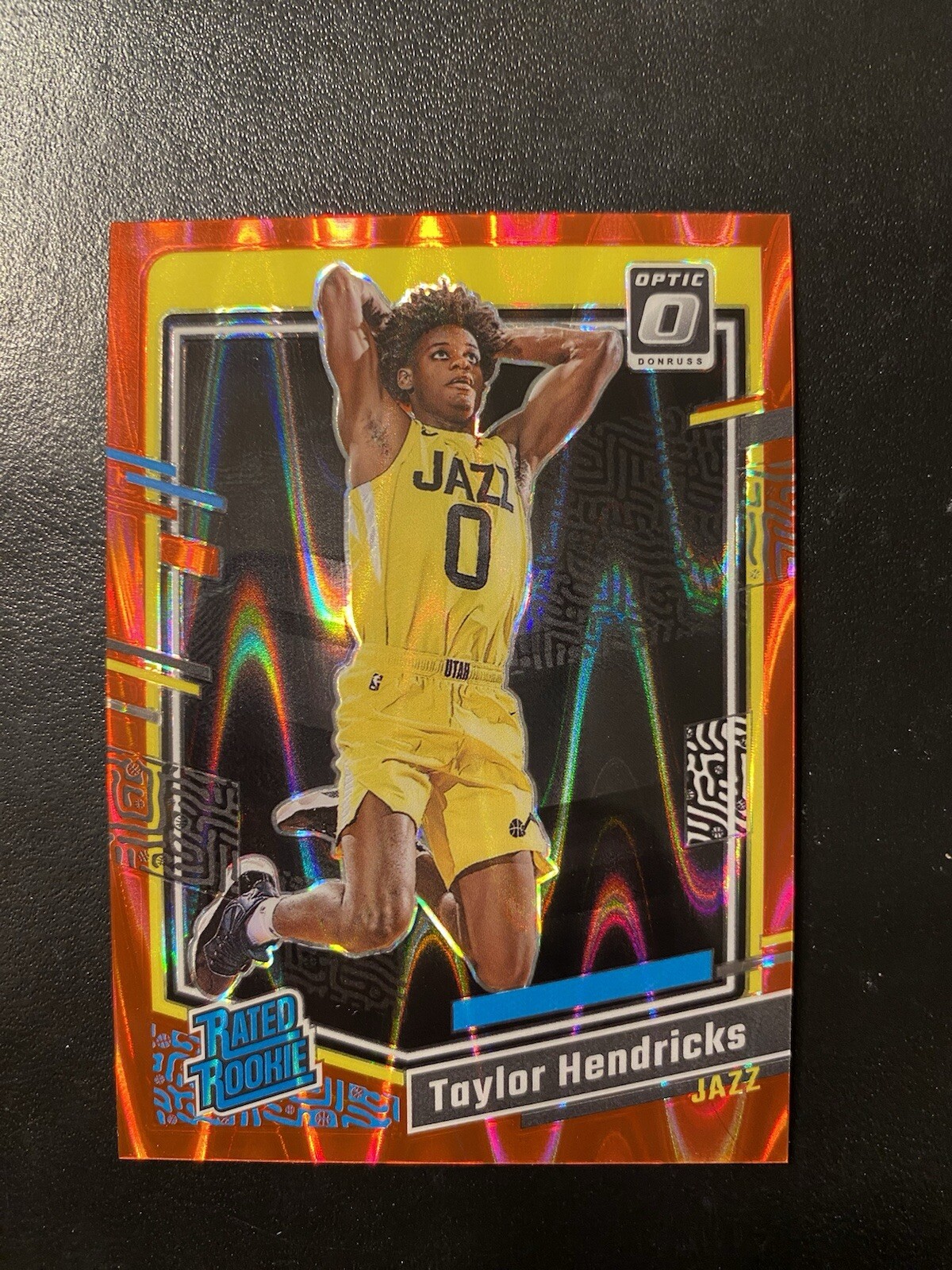 2023-24 Panini Optic - Rated Rookie Red Seismic Prizm #233 Taylor Hendricks /130