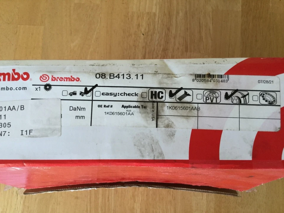 Dos nuevos rotores de freno trasero Brembo 08.B413.11 - Premium recubierto UV OE, se adapta a Audi y VW Foto 4 de 4