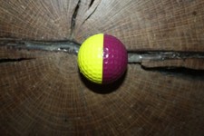 VINTAGE PLUM AND YELLOW PING GOLF BALL