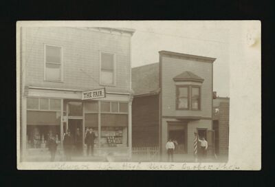 High River Alberta several men standing in front of a hardware sh- Old Photo