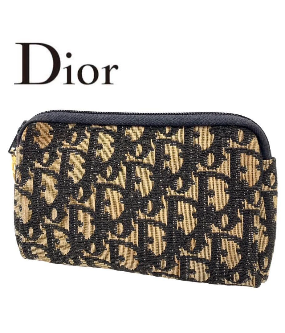 Mini pochette noire Christian Dior trotteur porte monnaie occasion design élégant