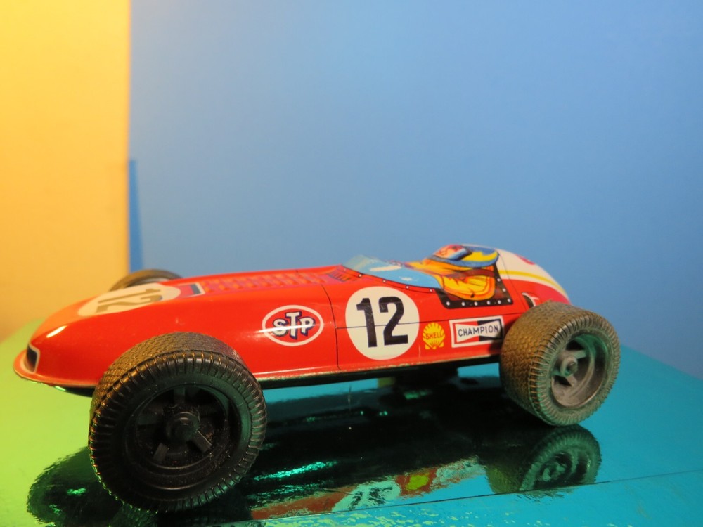 Vintage 5.5 inch Tin Race Car, litho, #12 Red STP logo