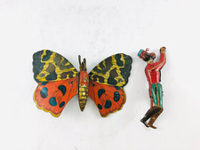 Tin Toy Monkey  Butterfly Ancient