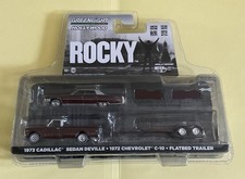 Greenlight Hollywood Rocky 1973 Cadillac Sedan DeVille/1972 Chevy C-10 Trailer