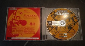 Capcom vs SNK Millennium Fight 2000 Ken Silver Lighter w/ Dreamcast fan disc