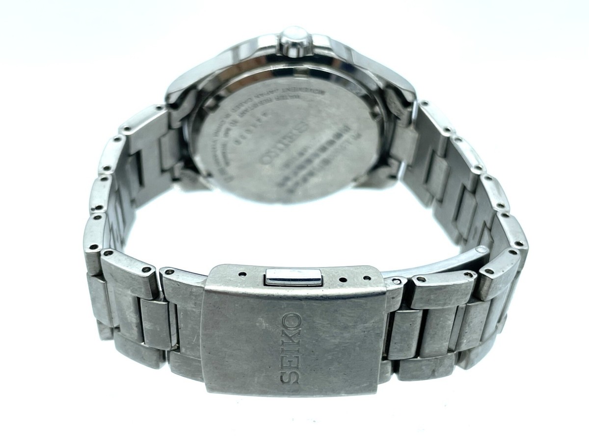 SEIKO Solar Titanium Men's Watch Black Dial Weighs 2.1 oz