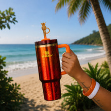 The Stanley 1913 x KAROL G 40 oz Quencher H2....