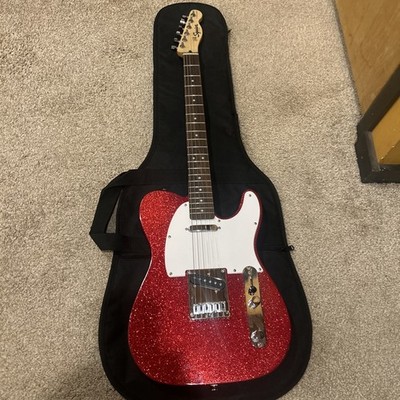 Squier FSR Red Sparkle Telecaster With Gig Bag. 