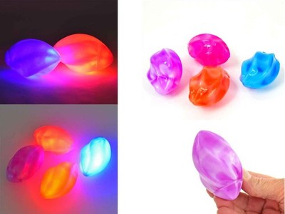 4 x Sternfrucht Antistress Ball Spielball mit LED Licht blinkend 8 x 4,8 cm