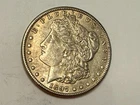 1897-S Morgan U.S. silver dollar. Choice AU, light gold tone. #rd1