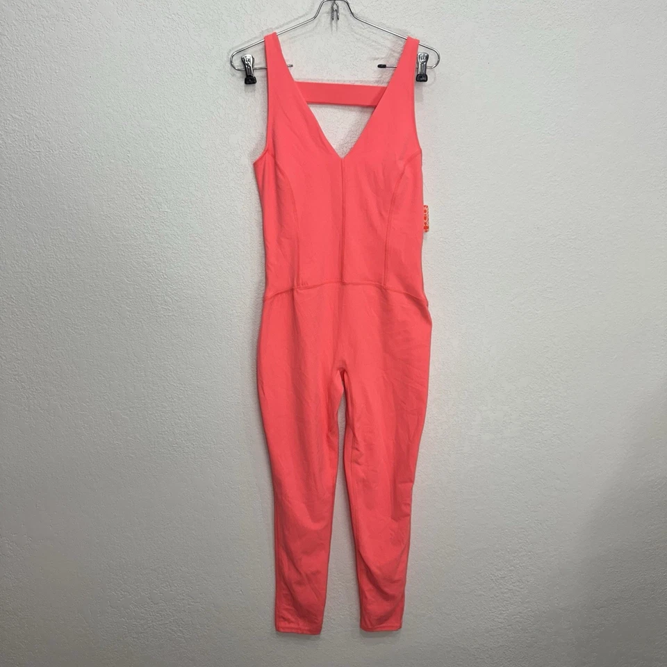 NUEVO CON ETIQUETAS $98 Mono de una pieza Free People Movement Never Better en coral neón talla M Foto 3 de 4
