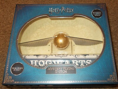 HARRY POTTER MYSTERY FLYING SNITCH PLUS HARRY
