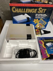 Nintendo NES Challenge Set.  Box, Manual, Console, Power Adapter And Game Genie.