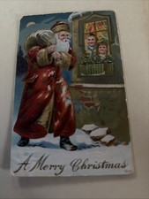 Antique Embossed Christmas  Postcard Santa Bag Kids In Window