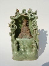 CHINESE LONGQUAN CELADON AND BISCUIT GUANYIN, MING DYNASTY