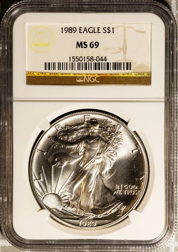 1989 $1 Silver American Eagle MS 69 NGC # 1550158-044 + Bonus