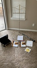 Clarinet With Stand, Case, And Beginner Music Books And Sheets