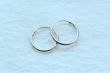 Pair of Silver Toned Hoop Earrings *Continuous Hoop Closure*         *.4 Grams*