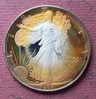 1986 AMERICAN SILVER EAGLE 1 OUNCE COIN WITH UNBELIEVEABLE TONING