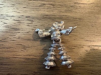 Unique movable vintage pin man in silver with dangling legs