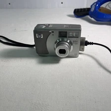 HP Photosmart 3.2 MP Has Batteries And Cord . Works Great