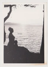 Silhouettes of Love Young Woman and Child by the Bay at Sunset Abstract Snapshot