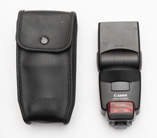 Canon Speedlite 420EX con custodia - funzionante, buone condizioni.