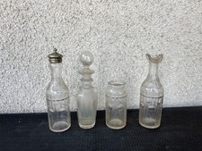 Lot de 4 petits flacons anciens en verre
