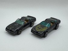2 HOT WHEELS HOT BIRD TRANS AM BLACK WALL MADE IN HONG KONG BLUE WINDOWS 1977