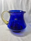 Vintage Blenko Art Glass Cobalt Blue Pitcher with an applied yellow handle 2005