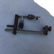 Machine shop precision tapping head fixture with chuck