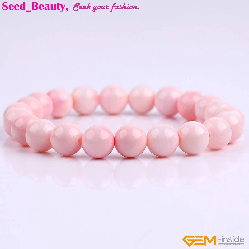 AAA Rosa Claro Caracola Lobatus Shell Natural Cuentas Chakra Elástico Pulsera Reiki Foto 3 de 4