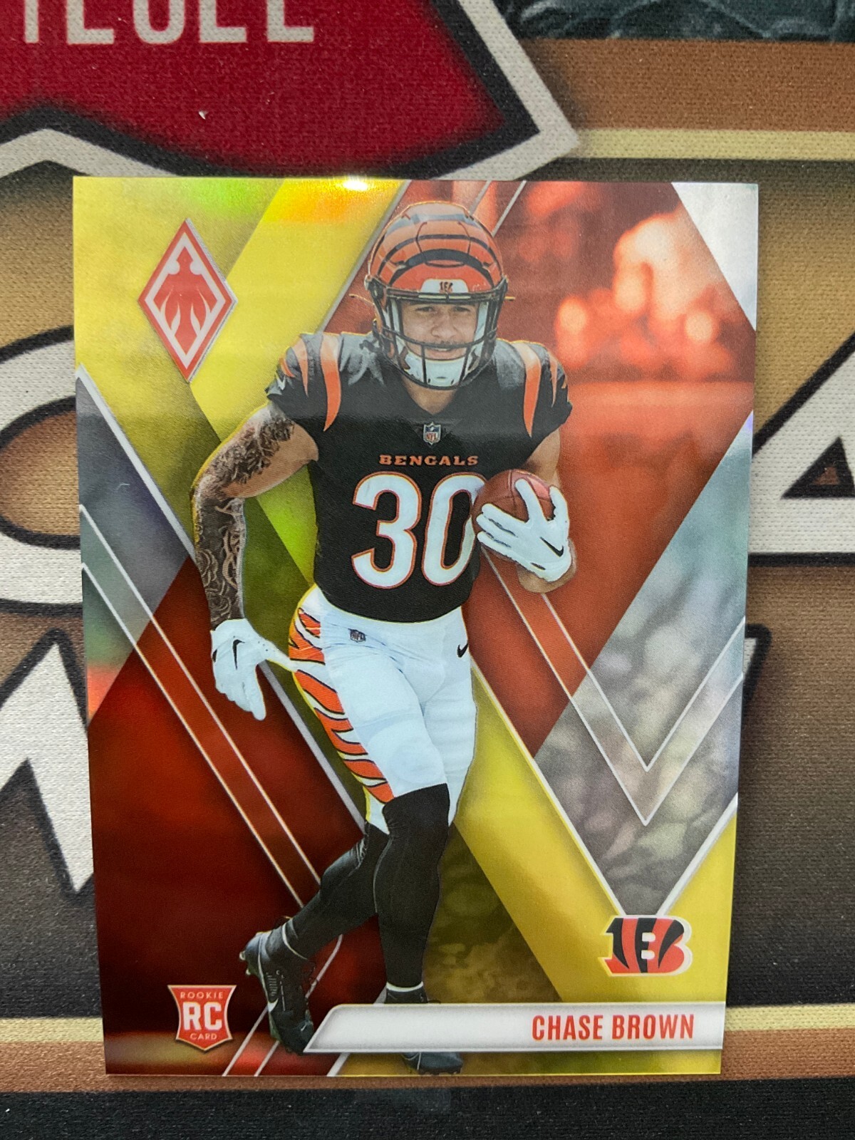 Chase Brown 2023 Panini Phoenix Football Yellow RC /75 #133